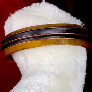 Copper cuff marked T Hawk